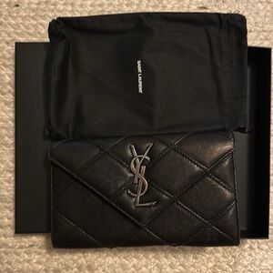 Authentic Black YSL wallet. Never used.